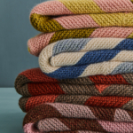 free Knitter's Choice Striped Blanket knitting pattern in Purl Soho's Yonder yarn