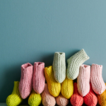 free Happy Feet Booties knitting pattern in Purl Soho's Cotton Chirp DK Minis yarn