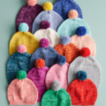 Baby Pom Pom Hat free Baby Pom Pom Hat knitting pattern in Purl Soho's Fine Print yarn