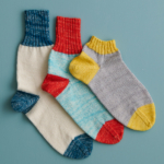 Easy Heel Colorblock Socks in Fine Print Easy Heel Colorblock Socks knitting pattern in Purl Soho's Fine Print sock yarn