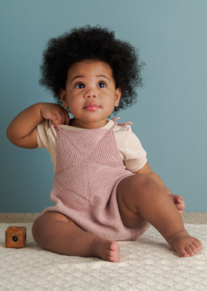 Ainur Berkimbay for Purl Soho: Pinwheel Baby Romper in Stormy Superwash Sock | Purl Soho